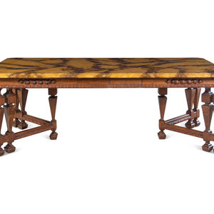 Appraisal: A Renaissance Revival Style Carved Walnut Faux Marble-Top Dining Table