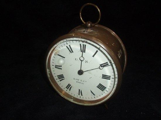 Appraisal: A brass cased signal box clock the dial with Roman