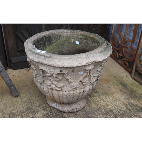 Appraisal: Composite stone circular pot planter with decoration approx cm H