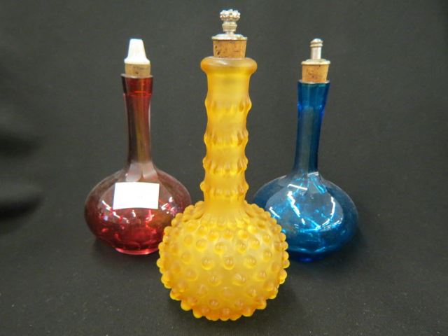 Appraisal: Victorian Art Glass Barber Bottles cranberry blue and hobnail amber