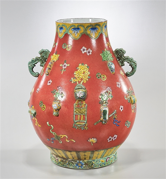 Appraisal: Chinese enameled porcelain vase with handles to neck and still