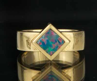 Appraisal: A Ladies' Black Opal Ring k yellow gold band set