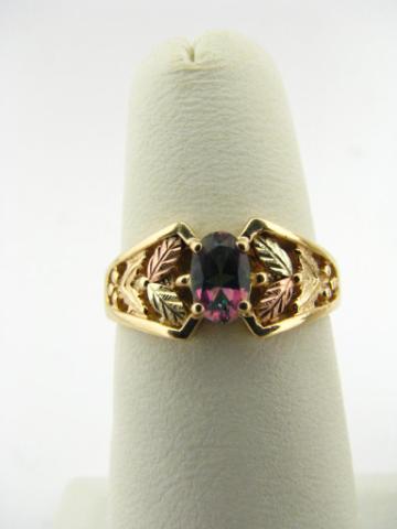 Appraisal: K rose and yellow gold lady's ring with opalescent colored