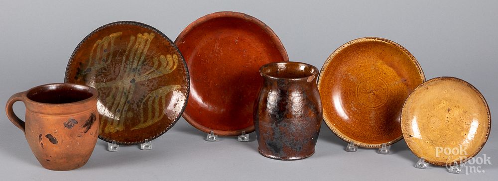 Appraisal: Six pieces of Pennsylvania redware th c Six pieces of