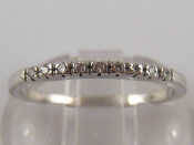 Appraisal: A white metal tests carat gold diamond ring size L