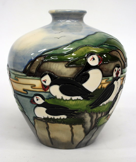 Appraisal: A MOORCROFT PUFFIN PATTERN VASE signed Kerri and dated cm