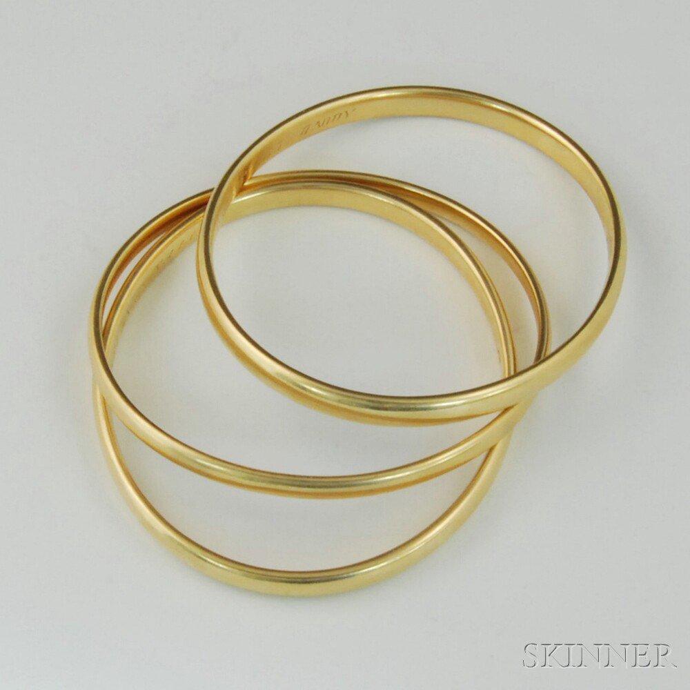 Appraisal: Three kt Gold Bangles Sloan Co dated dwt interior cir