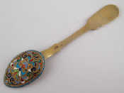 Appraisal: A Russian cloisonne silver gilt fiddle pattern teaspoon unascribed maker