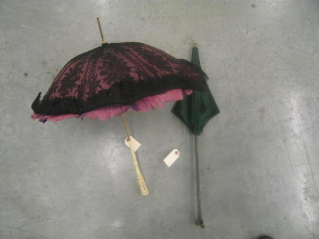 Appraisal: Antique Parasols one with carved bone handle