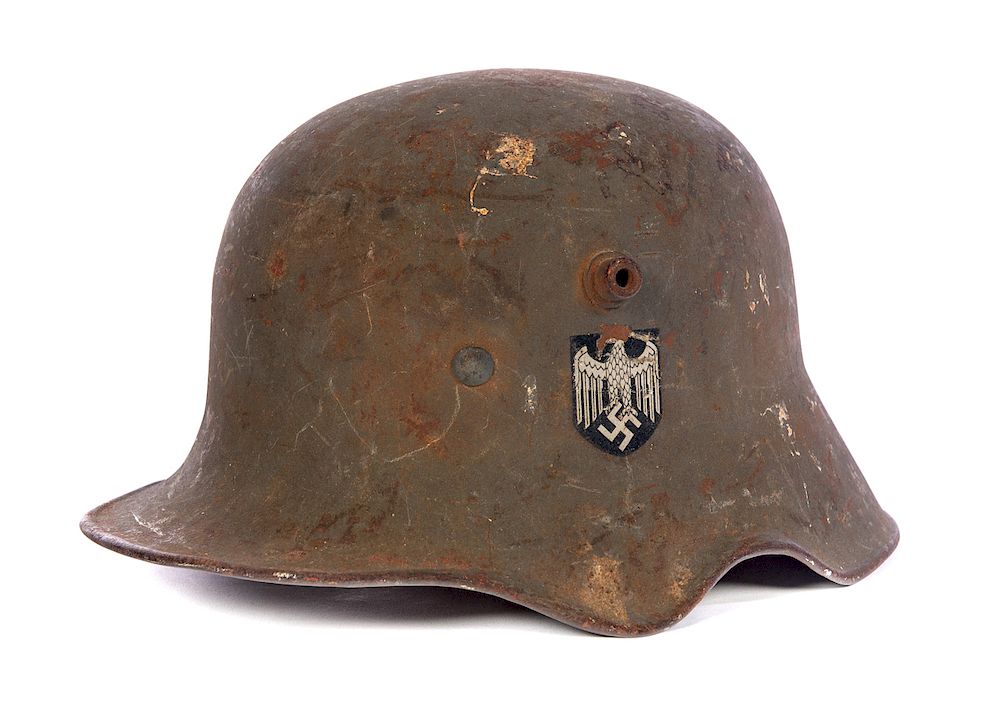 Appraisal: WWII Helmet with Local History On left inside rim ET