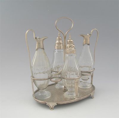 Appraisal: A George III cruet frame with a reeded loop handle