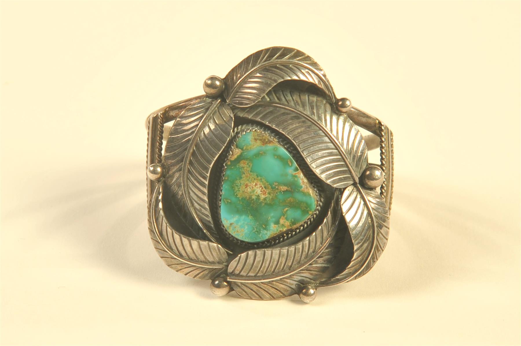 Appraisal: NAVAJO TURQUOISE AND STERLING CUFF SIGNED LOREN BEGAY Fourth quarter-