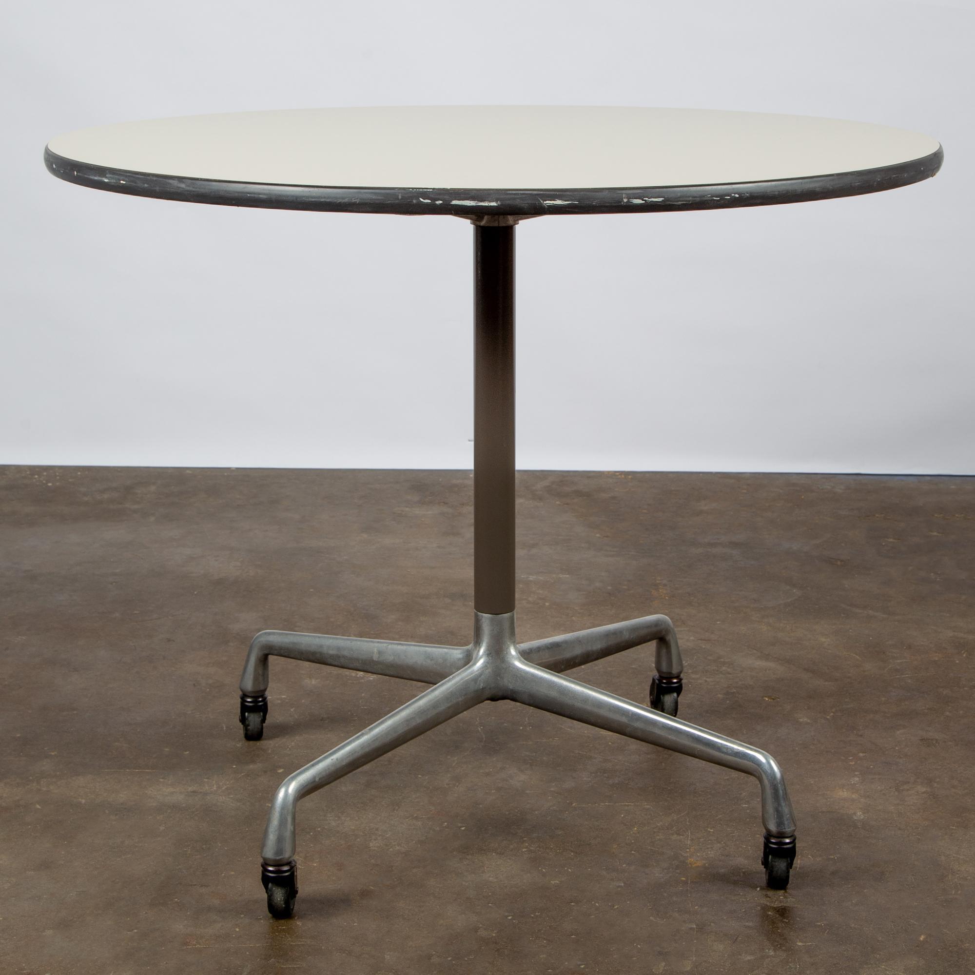 Appraisal: EAMES ROUND WHITE LAMINATE TABLE A Ray and Charles Eames