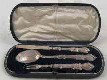 Appraisal: A Victorian baby's three piece cutlery set in original fitted