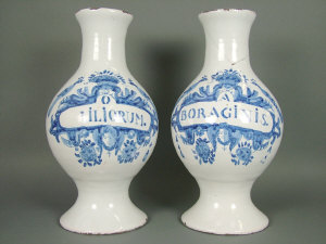 Appraisal: A pair of delft blue and white apothecary jars th