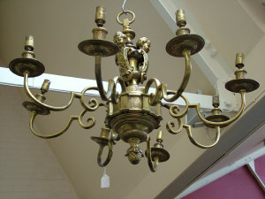 Appraisal: An early th century style eight branch brass chandelier the