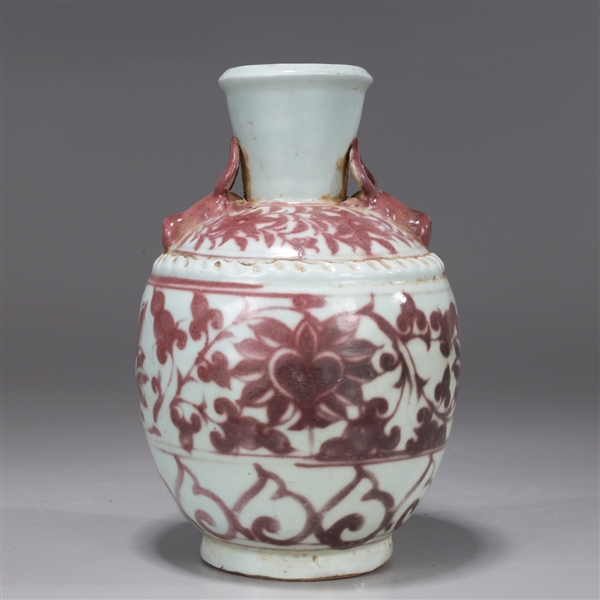 Appraisal: Chinese red underglaze white porcelain vase with ox head handles