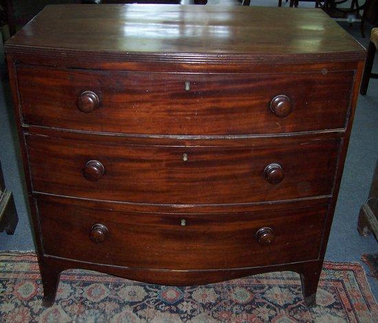 Appraisal: A th Century mahogany bowfront chest fitted three long drawers