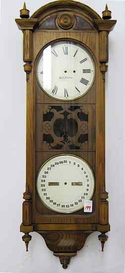 Appraisal: SETH THOMAS OFFICE CALENDAR NO an oak cased double-dial calendar