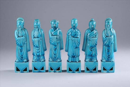 Appraisal: SIX CHINESE TURQUOISE PORCELAIN FIGURES OF IMMORTALS Late Qing Dynasty