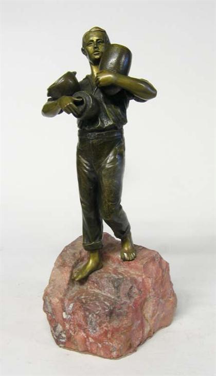 Appraisal: Continental bronze figure of a farm workerprobably austrian early th