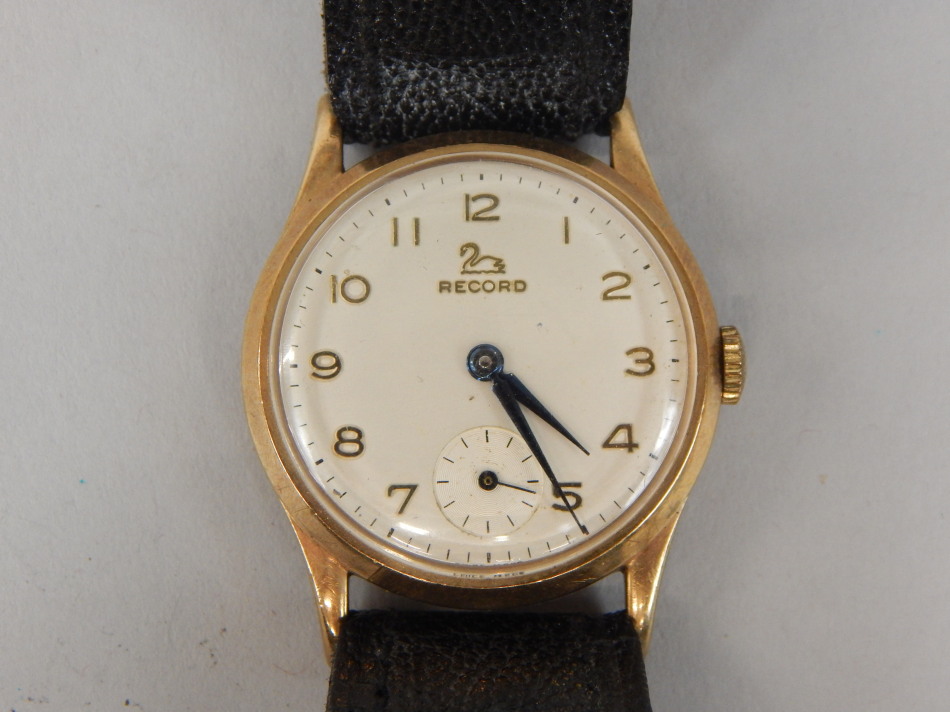 Appraisal: A Record gentleman's wristwatch with champagne coloured dial subsidiary seconds