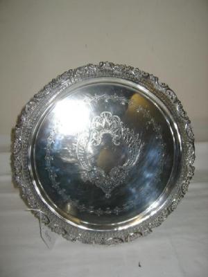 Appraisal: A VICTORIAN SALVER of circular form with pierced border and