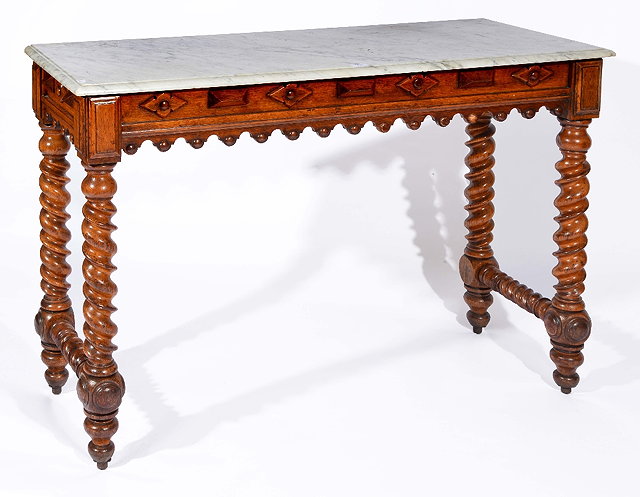 Appraisal: Victorian style oak marble top tablethe base with Gothic revival