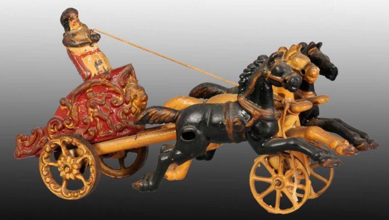 Appraisal: Cast Iron Hubley Horse-Drawn Chariot Toy Description Includes original driver