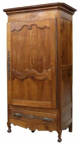 Appraisal: French Provincial fruitwood armoire th c molded cornice single paneled