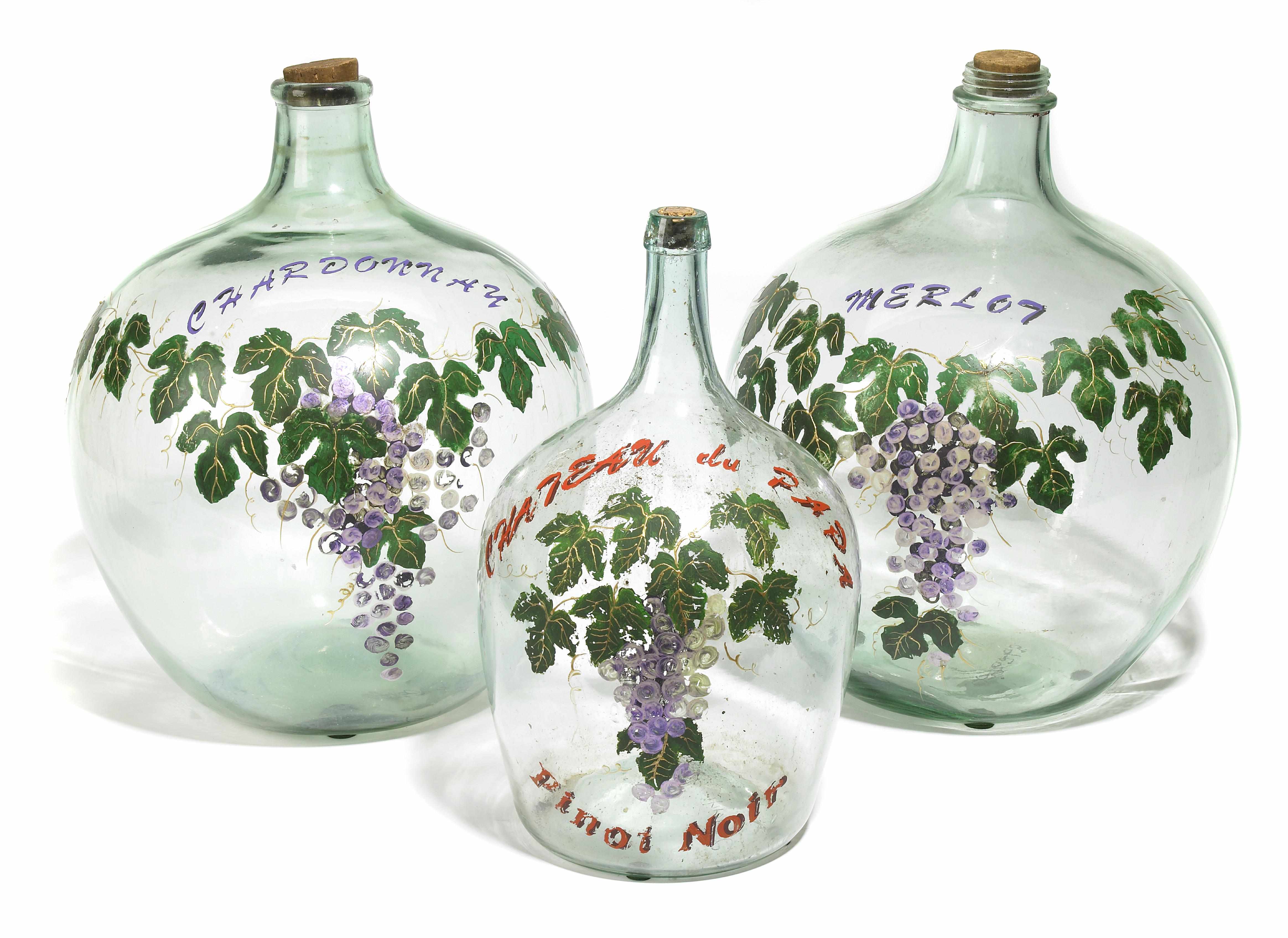 Appraisal: A group of three paint decorated glass vessels Decorated with