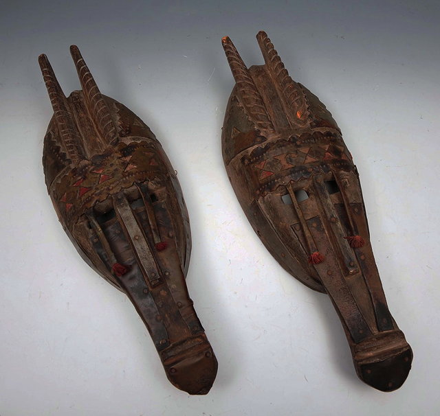 Appraisal: TWO AFRICAN BAMBARA TRIBE MASKS with applied pressed metal ornament