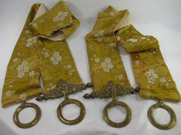 Appraisal: Vintage silk fabric panels with brass ornamental ends Each measures