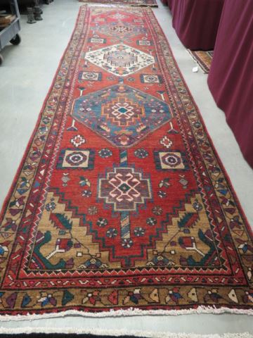 Appraisal: Heriz Persian Handmade Runner geometric medallions deep earthtones ' x