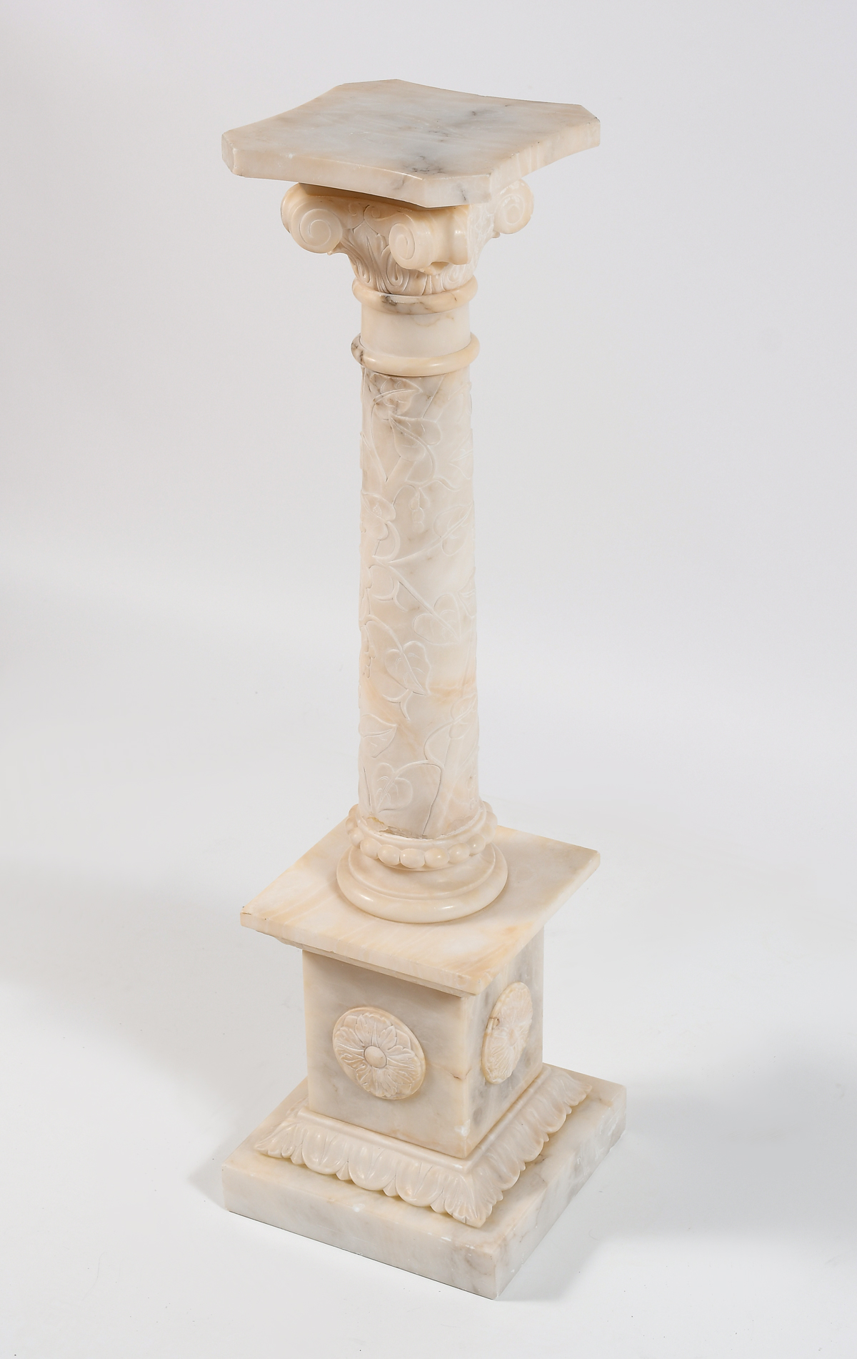 Appraisal: CARVED COLUMNAR FOLIATE MOTIF ALABASTER PEDESTAL Approximately '' in height