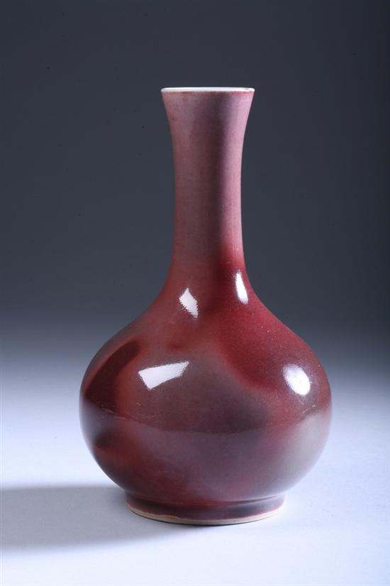 Appraisal: CHINESE PEACH BLOOM PORCELAIN VASE Qing Dynasty Pear-shape rising from