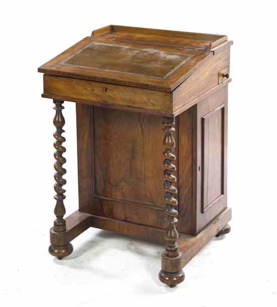 Appraisal: A Victorian Davenport Desk of typical form with barley twist