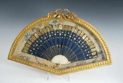 Appraisal: An Antique Fan Framed in a Shaped Shadow Box A