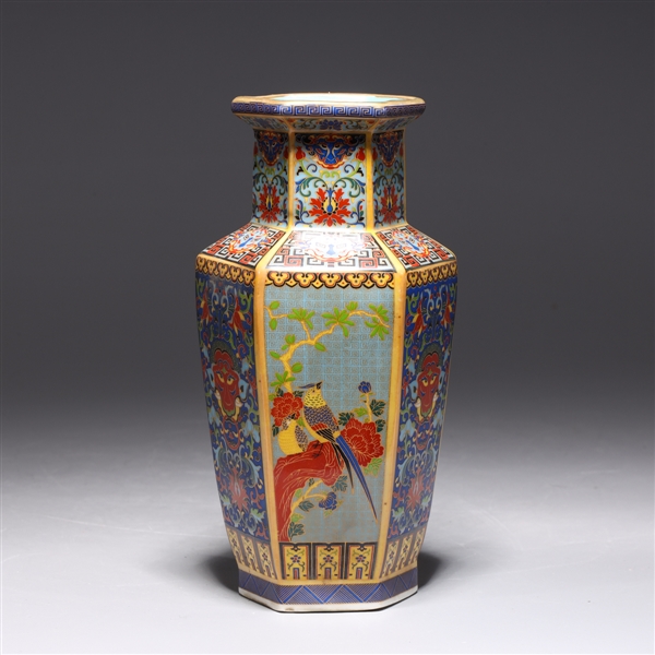 Appraisal: Chinese faceted porcelain vase with gilt detail and allover designs