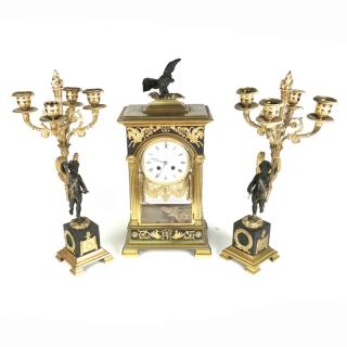 Appraisal: Neoclassical Three-piece neoclassical-style garniture set comprising clock and pair of