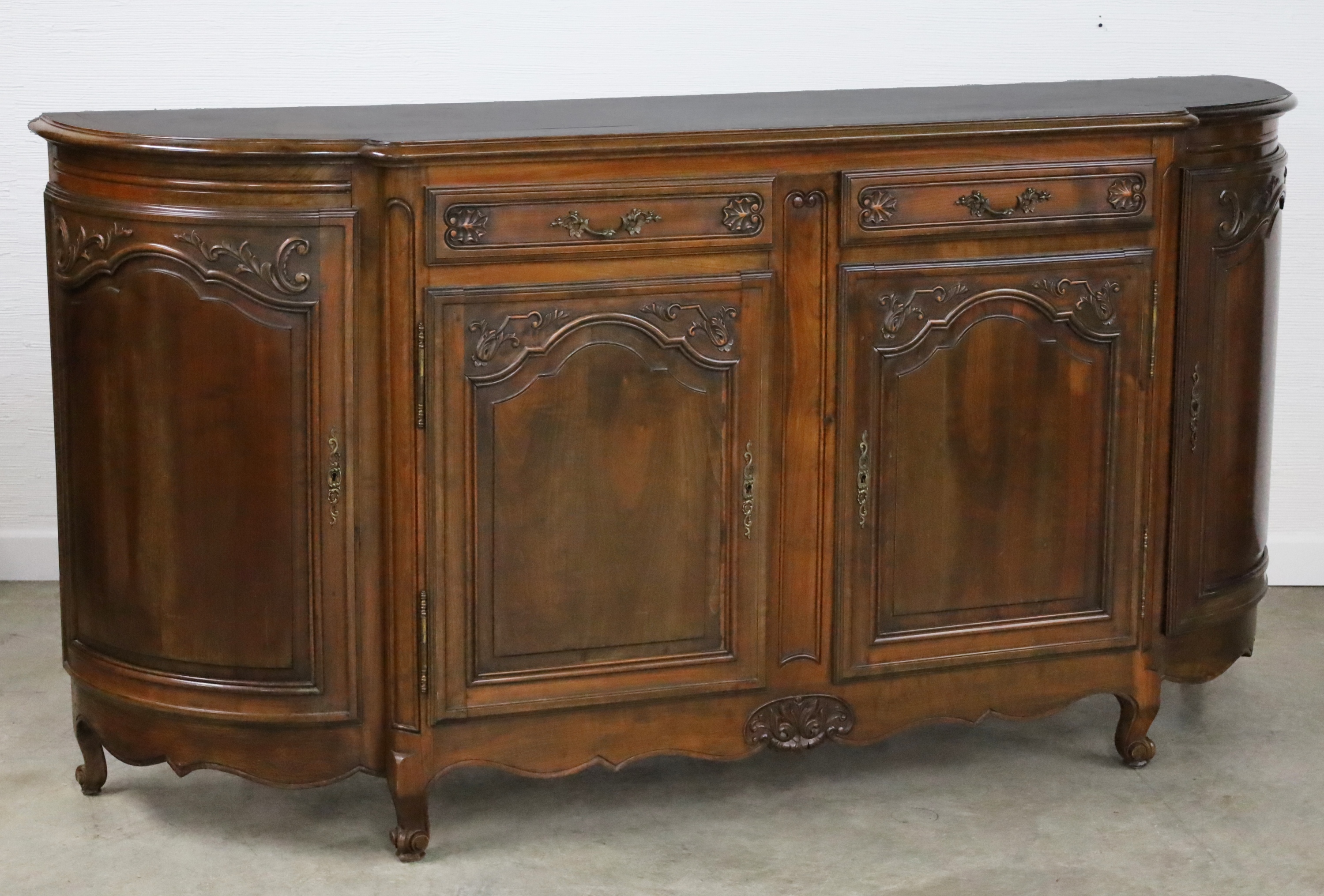 Appraisal: FRENCH LOUIS XV STYLE CARVED WALNUT BUFFET French Louis XV