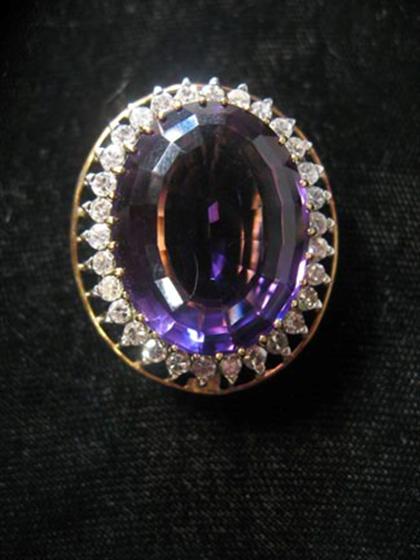 Appraisal: karat yellow gold amethyst and diamond pendant Large oval cushion