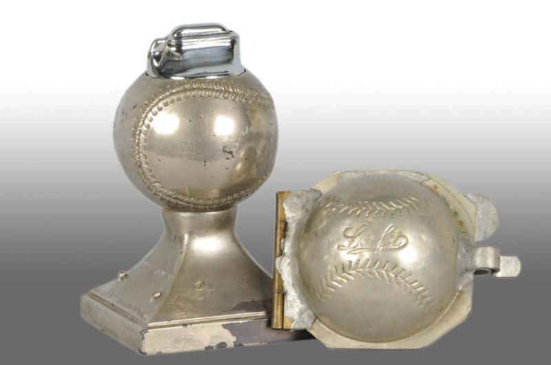 Appraisal: Lot of Early Metal Baseball Items Description Includes cigarette lighter