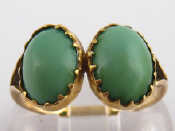 Appraisal: A yellow metal tests carat gold two stone turquoise ring