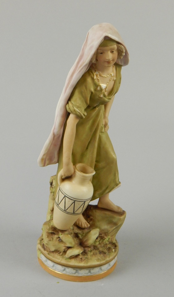 Appraisal: An early thC Royal Dux figure of a lady holding