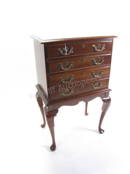 Appraisal: A Queen Anne period-style mahogany silver chest drawers three with