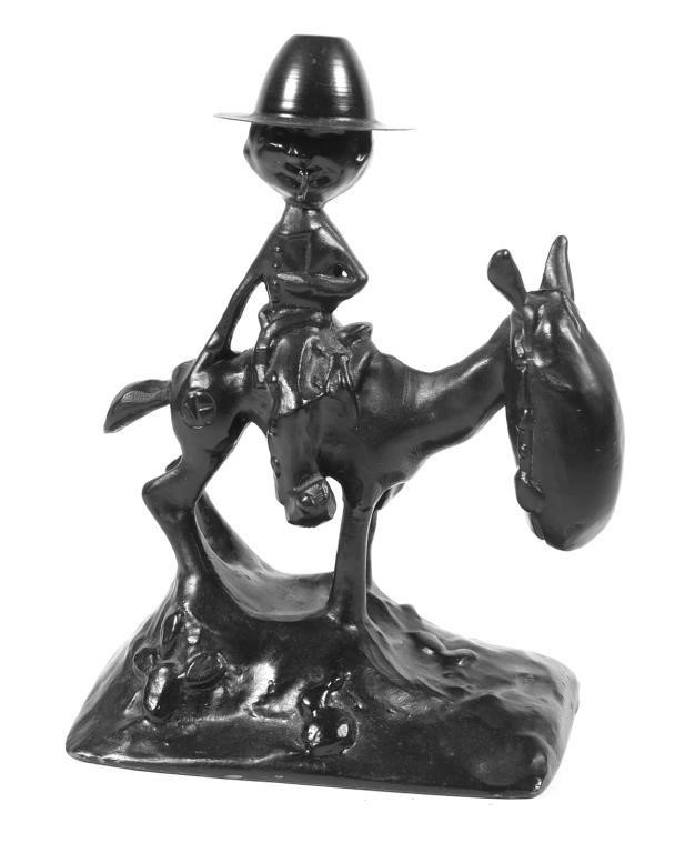 Appraisal: Interesting hollow cast spelter sculpture painted black of a cowboy