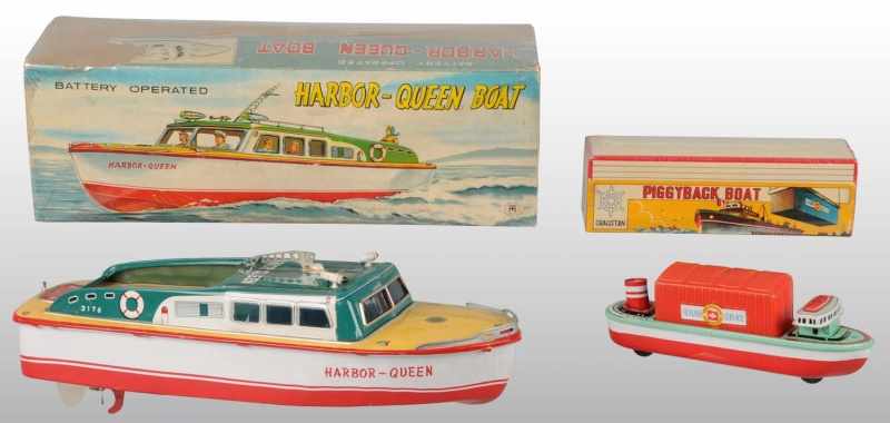 Appraisal: Lot of Tin Litho Harbor Boat Toys Description Japanese Working