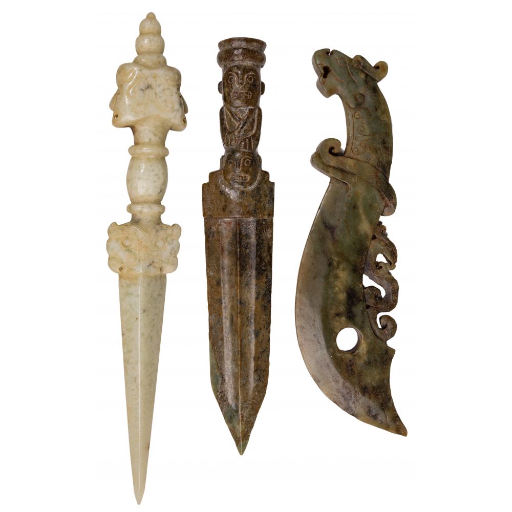 Appraisal: CHINESE RITUAL DAGGER ASSORTMENT archaic style carved jade daggers including