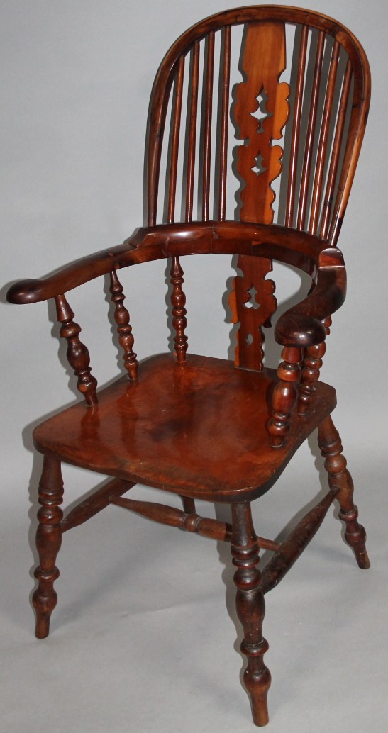 Appraisal: A thC yew and elm high back Windsor chair the